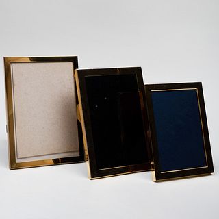 Two Silver-Gilt Picture Frames and a Brass Picture Frame