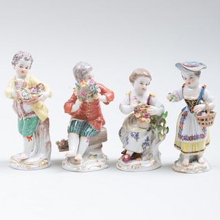 Group of Four Meissen Porcelain Figures with Baskets and Flowers
