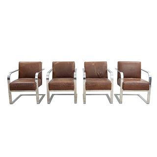 Lote de 4 sillones. Estados Unidos. Siglo XXI. Estructura de metal plateado. Marca Ralph Lauren Home. Con respaldos y asientos en piel.