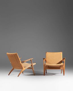 Hans J. Wegner
(Danish, 1914-2007)
A Pair of CH-25 Lounge Chairs, Carl Hansen & Son, Denmark