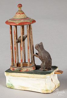 Cat and bird in cage pipsqueak toy, 19th c.