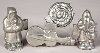 Four pewter chocolate or ice cream molds