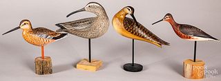 Four carved and painted shorebird decoys