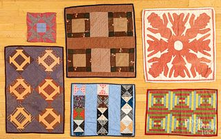 Five assorted doll quilts