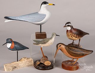 Five carved and painted birds