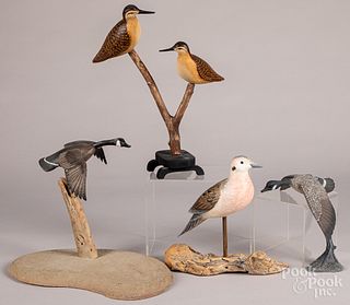 Three carved and painted bird groups