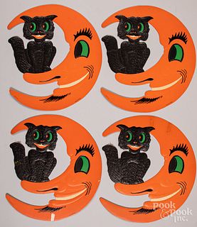 Four Halloween cat and moon cutouts, by Luhrs