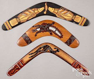 Three Australian boomerangs, with painted fish