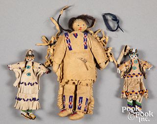 Three small Native American Indian dolls