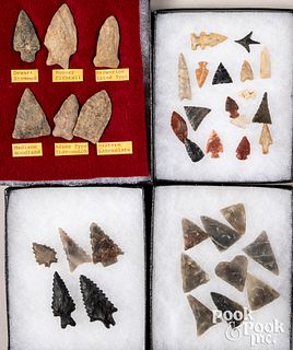 Four Riker mounts of stone points and arrowheads