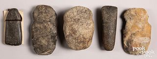 Five ancient stone axes and celts