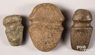 Three ancient full grooved stone axe heads