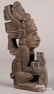Stone carved Aztec statue