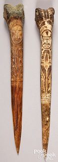 Two Papua New Guinea carved bone daggers
