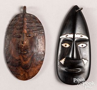 Papua New Guinea miniature carved mask pendant