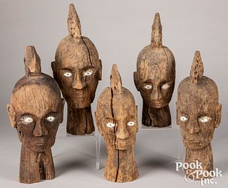 Five Timor carved wooden ancestral heads