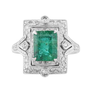 18KT EMERALD AND DIAMOND RING