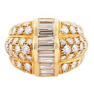 GOLD AND DIAMOND RING WITH ROW OF BAGUETTES