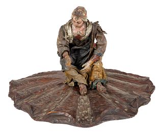 A POLYCHROME WOOD AND CLOTH FIGURE WITH STAND, 20TH CENTURY