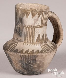 Prehistoric Pueblo strap-handled vessel