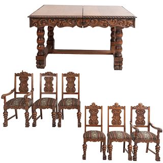 Comedor. Siglo XX. Estilo español. En talla de madera. Consta de: Mesa, 2 sillones y 4 sillas. Piezas: 7.