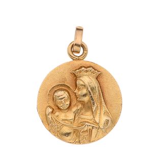 Medalla en oro amarillo de 18k. Doble imagen Virgen con niño y Sagrado corazon de Jesús. Peso: 3.4 g.