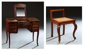 French Louis XV Style Carved Mahogany Dressing Table, early 20th c., the center lifting lid with an interior mirror, over a lower drawer, flanked by t