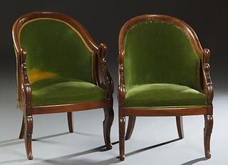 Pair of Louis Philippe Empire Style Carved Beech Bergeres, 19th c., the curved back over swan head arms and a bowed seat on curved saber legs, now uph