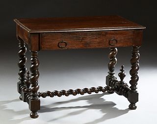 French Provincial Louis XIII Carved Oak Writing Table, 19th c., the stepped rounded edge top over a frieze drawer, on rope twist legs joined by an H-f