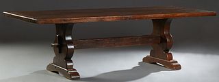 Large French Provincial Carved Oak Monastery Table, 19th c., the thick top on large trestle supports joined by a large rectangular stretcher, H.- 30 7