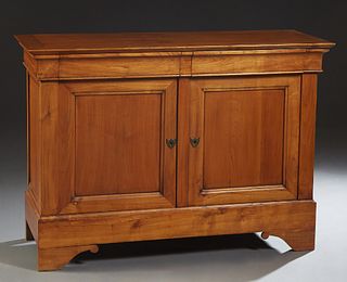 French Provincial Louis Philippe Carved Cherry Sideboard, 19th c., the rectangular top over two frieze drawers, above double cupboard doors, on a plin