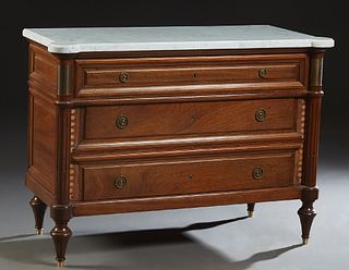 French Provincial Louis XVI Style Ormolu Mounted Carved Walnut Marble Top Commode, 19th c., the ogee edge cookie corner white marble over a frieze dra