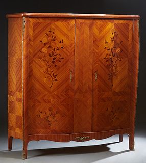 French Louis XV Ormolu Mounted Inlaid Mahogany Bombe Armoire, 20th c., the stepped serpentine crown over two marquetry inlaid bombe doors, flanked by 