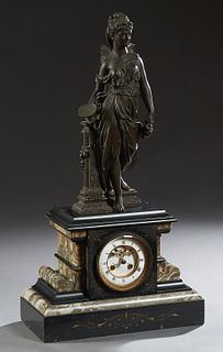 French Figural Marble Mantel Clock, c. 1880, with a patinated spelter surmount of Hebe, a classical winged maiden with a jug and a bowl, atop a steppe