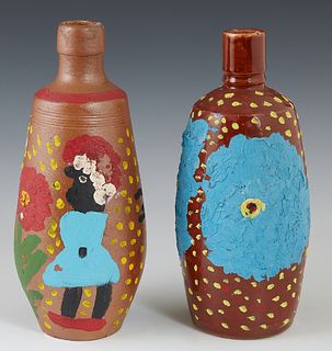 Two Clementine Hunter Paint Decorated Clay Ginger Beer Bottles, c. 1980, one with zinnias; the other with two figures, a flower and bird, each signed,