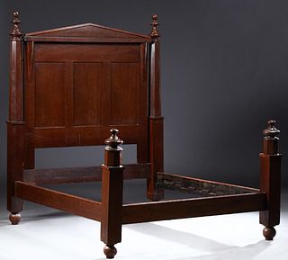 American Classical Revival Carved Mahogany Poster Bed, late 19th c., the tapered finial topped posts flanking a pointed headboard joined by two side r