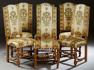 Set of Six Louis XIII Style Carved Walnut Dining Chairs, 20th c., the arched canted high back to a trapezoidal seat, on turned and block legs, joined 