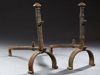 Pair of French Cast Iron Andirons, 19th c., with rounded octagonal ball tops, over tool holders, on curved relief decorated base, H.- 22 1/2 in., W.- 