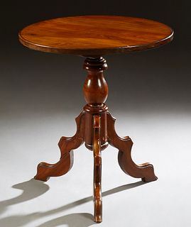 Louis Philippe Carved Walnut Gueridon, 19th c., the stepped circular top on a turned baluster urn support to tripodal cabriole legs, H.- 28 1/2 in., D