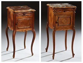 Two French Louis XV Style Carved Walnut Marble Top Nightstands, early 20th c., one with an inset highly figured rouge marble over a frieze drawer and 