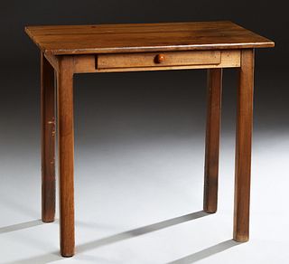 French Louis Philippe Carved Walnut Writing table, 19th c., the three board rectangular top over a shallow frieze drawer, on square legs, H.- 29 1/8 i