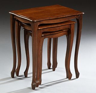 Nest of Three Louis XV Style Carved Oak Side Tables, 20th c., with serpentine stepped tops, on cabriole legs, Largest- H.- 22 1/2 in., W.- 20 in., D.-