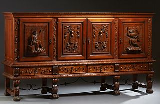 Spanish Carved Beech Renaissance Style Sideboard, 20th c, the gadroon edge crown over four cupboard doors with armorial and figural relief decoration 