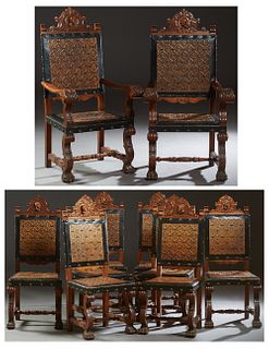 Set of Eight (6 +2) Spanish Carved Beech Dining Chairs, 20th c., the arched canted back with central relief figural armorial carving, over relief leat