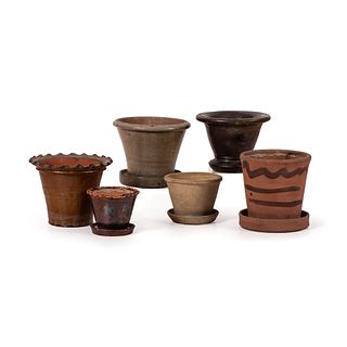 Six Stoneware and Redware Flower Pots