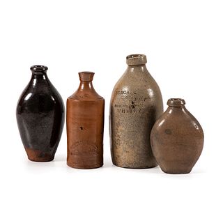 A Group of Stoneware Bottles and Flasks