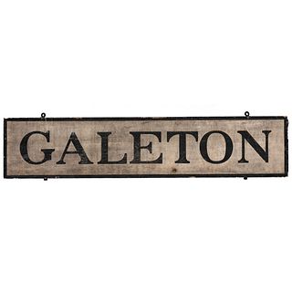A Painted Wood Galeton Sign, Possibly A Train Station Sign