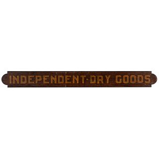 An Independent Dry Goods Painted Wood Trade Sign