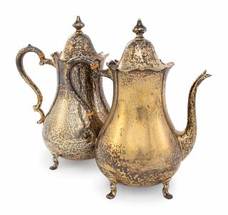 A Pair of Cartier Silver-Gilt Teapots