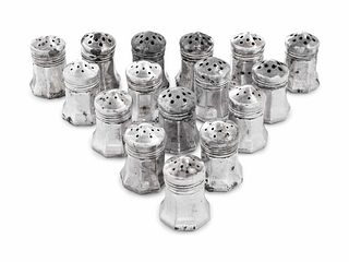 A Set of Sixteen Cartier Silver Casters
